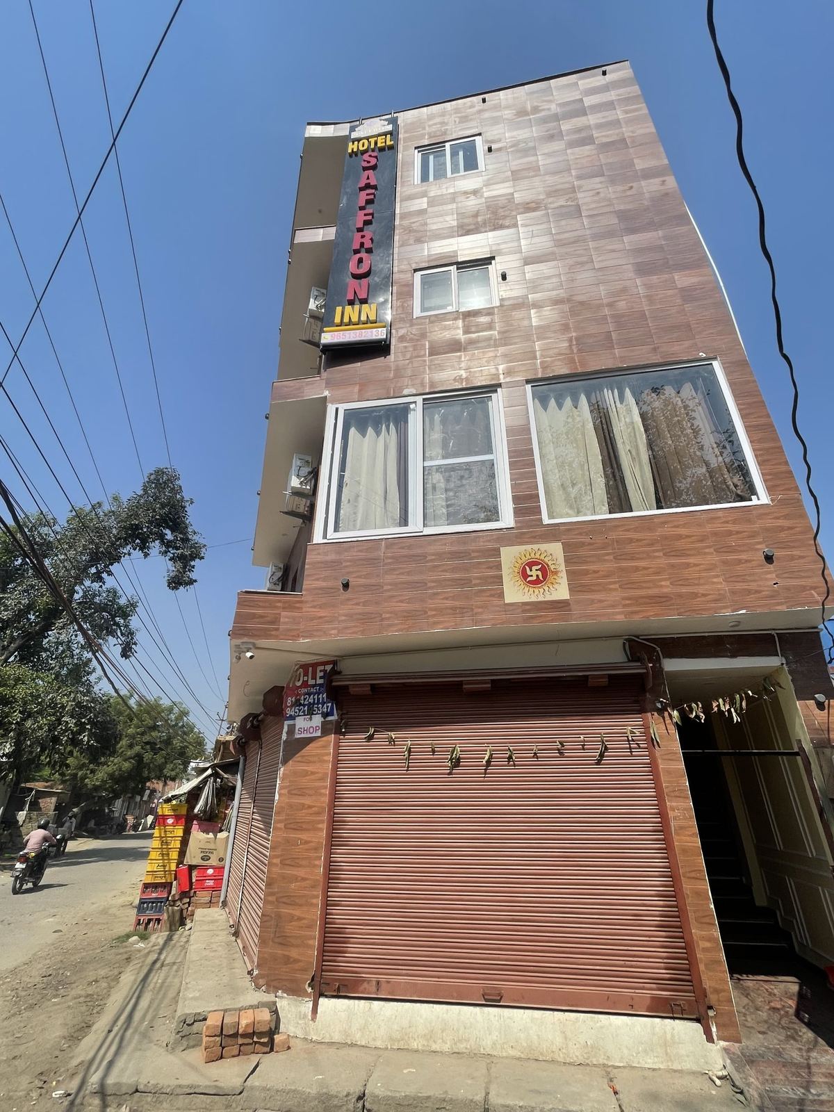 Hotel Saffron Inn building with the hotel sign